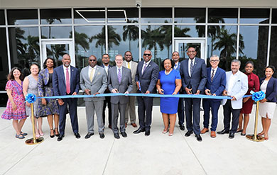 UVI President David Hall, Board of Trustee Member and Government Dignitaries prepare for the Ribbon Cutting